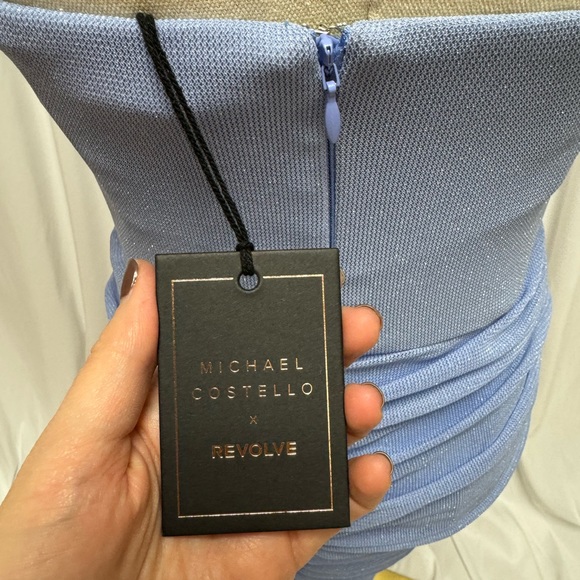 x REVOLVE India Midi Dress in Periwinkle
Michael Costello
Color: Periwinkle - Picture 7 of 10